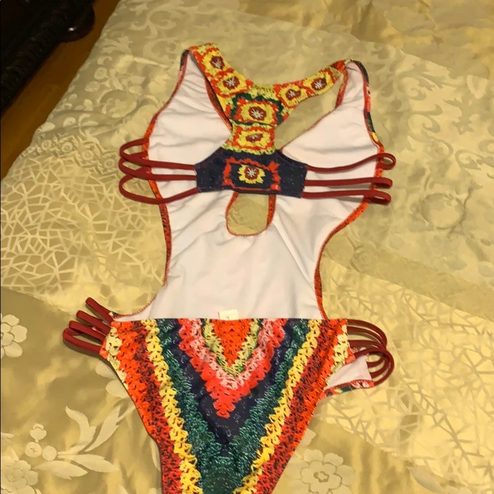 Definitely beautiful colored bathing suit